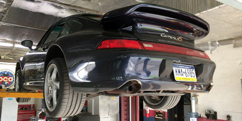 Porsche Carerra on a lift at Translog in York, PA